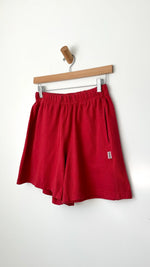 Load image into Gallery viewer, Flared basketball shorts (crayon red)
